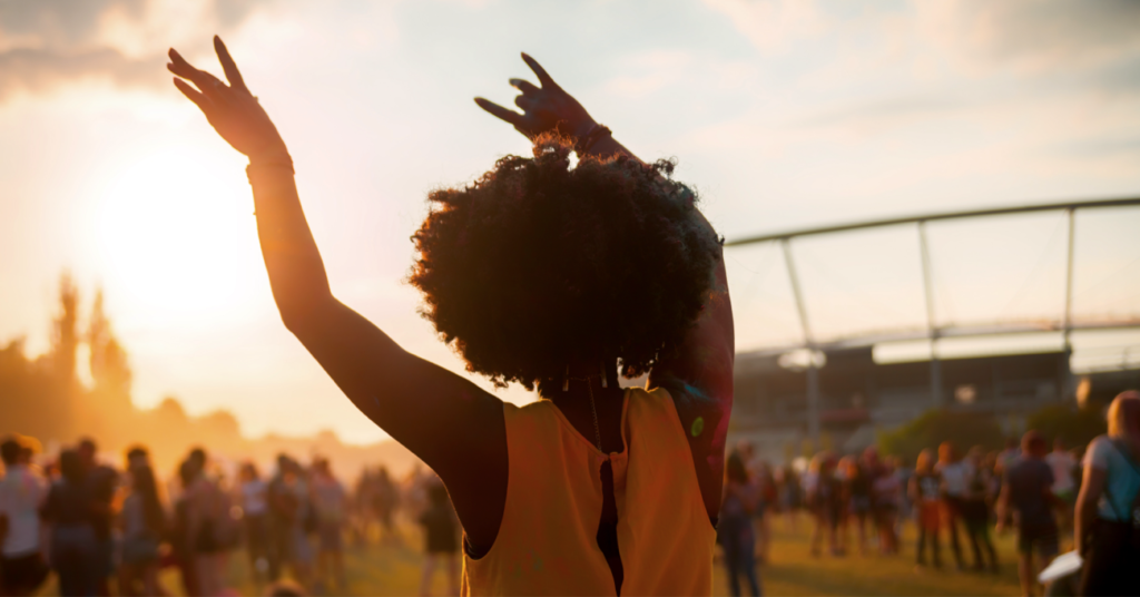 Woman Dancing in Crowd